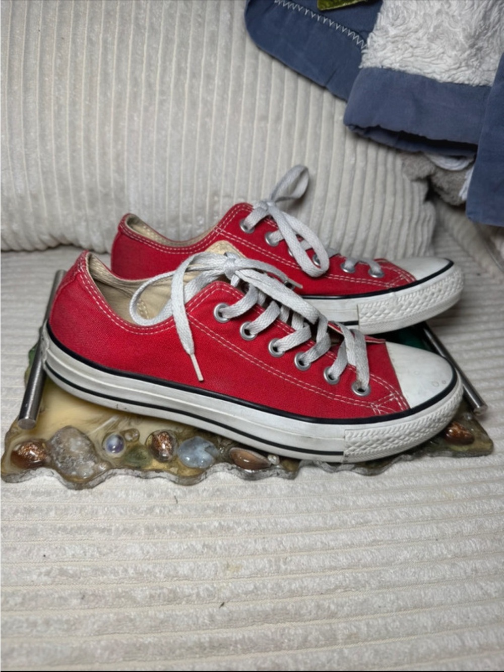 Red Low-Top Converse Sneakers with White Laces
